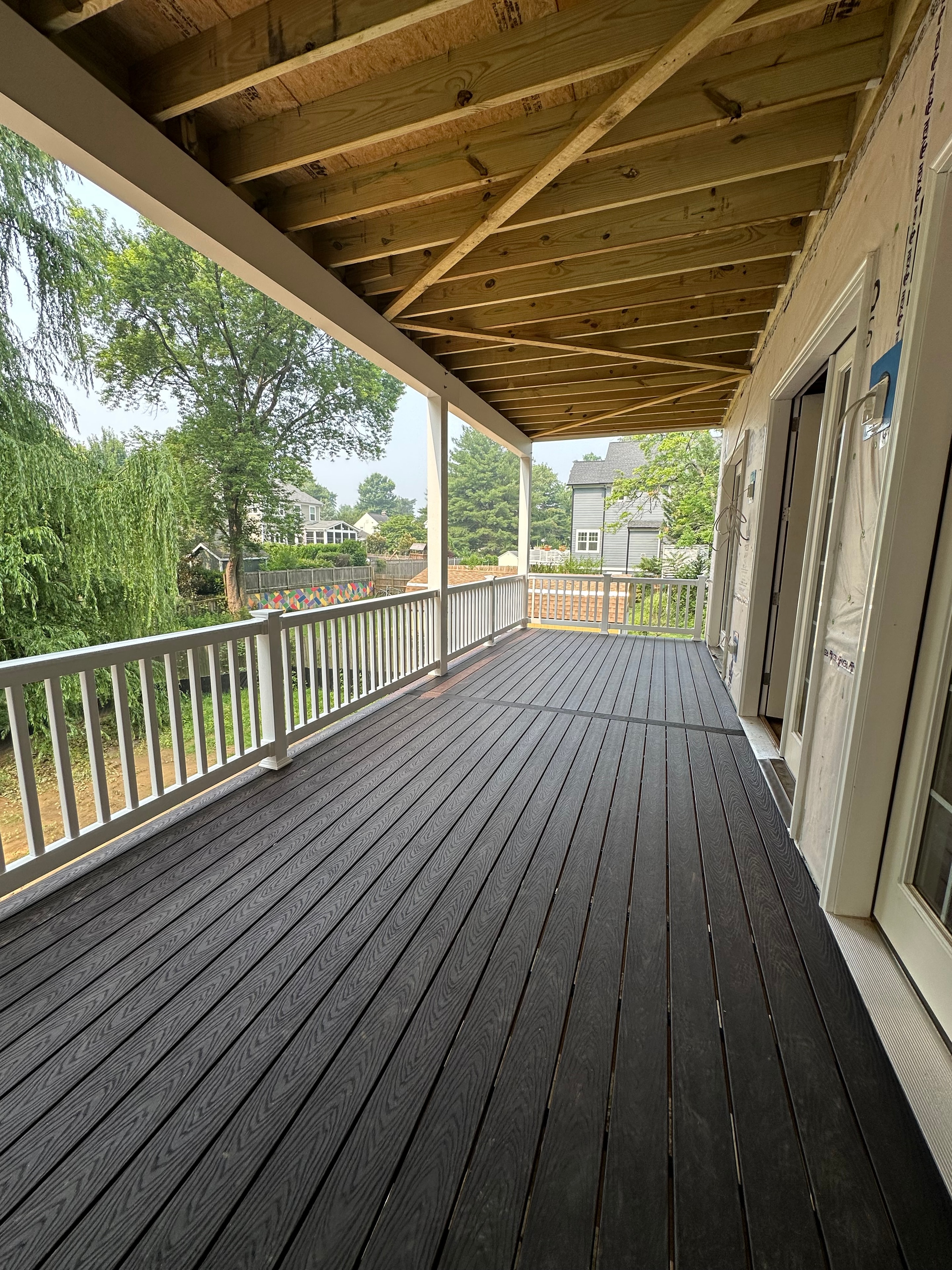 Big Deck Energy - Trex decking surface and covered porch detail